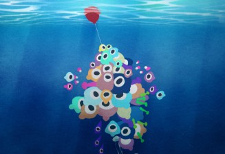 Plusieurs petits poissons accrochés à un ballon qui flotte